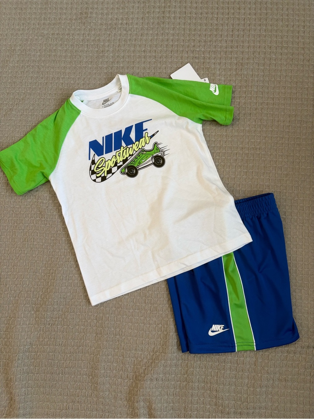 Nike White Tee with Green Raglan Sleeves and Blue Shorts